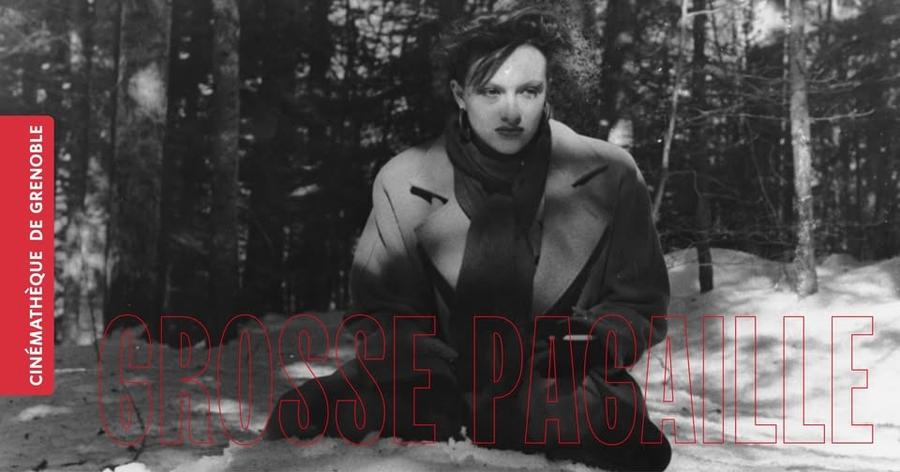 May be a black-and-white image of duffle coat, overcoat and text